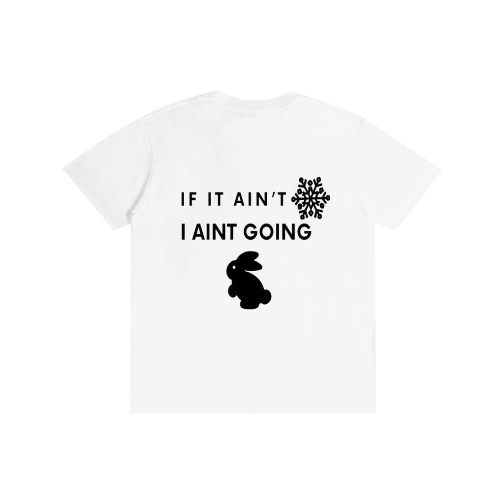 A white short-sleeve t-shirt with a black graphic print on the front. The design features the text 'IF IT AIN'T I AINT GOING' in a bold sans-serif font, accompanied by a black snowflake on the right and a black bunny silhouette below.